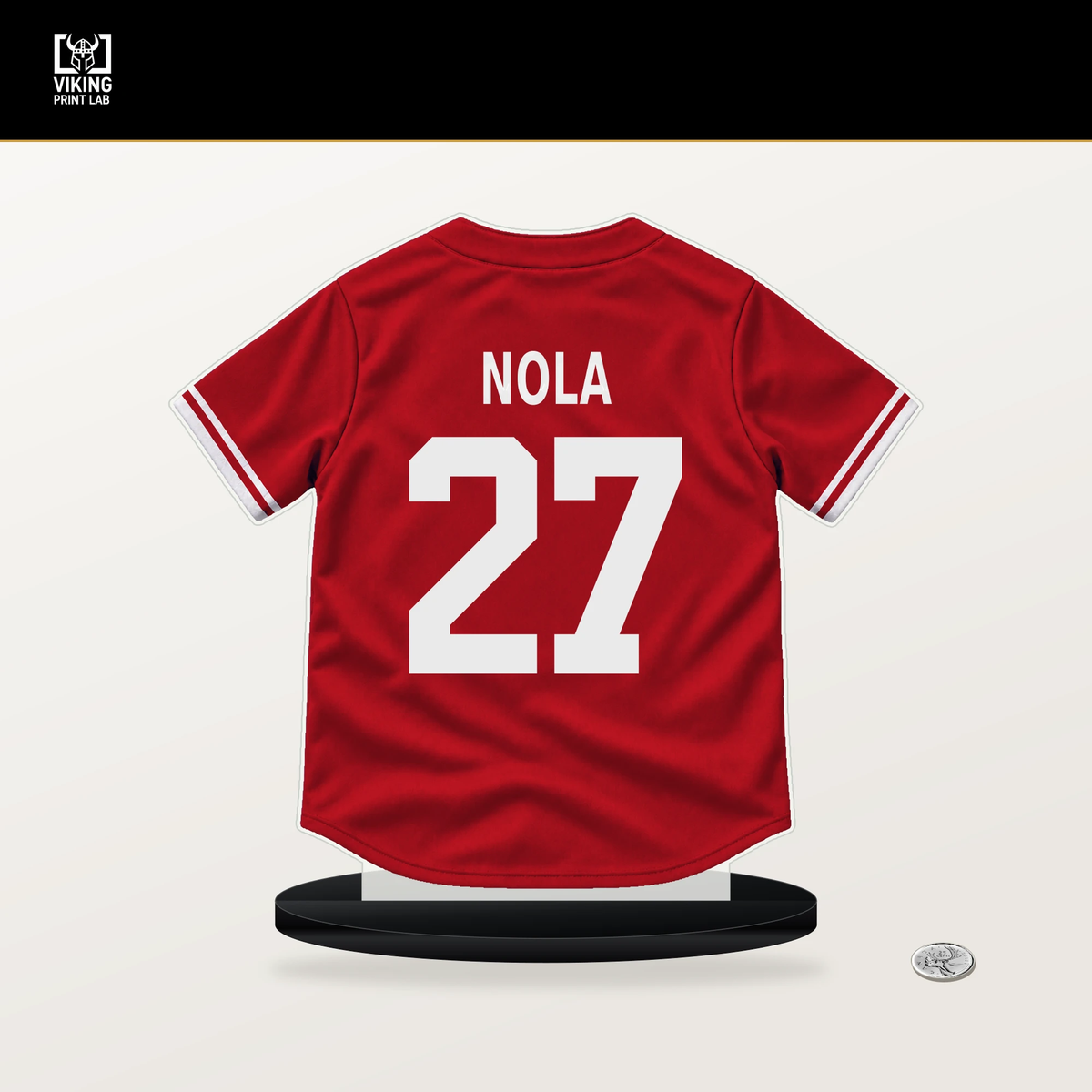 Aaron Nola number 27 Philadelphia Phillies jersey stand with included black base.