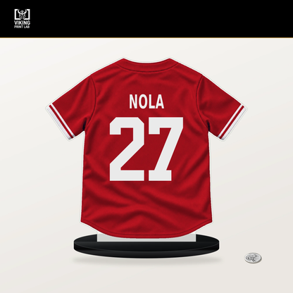 Aaron Nola number 27 Philadelphia Phillies jersey stand with included black base.