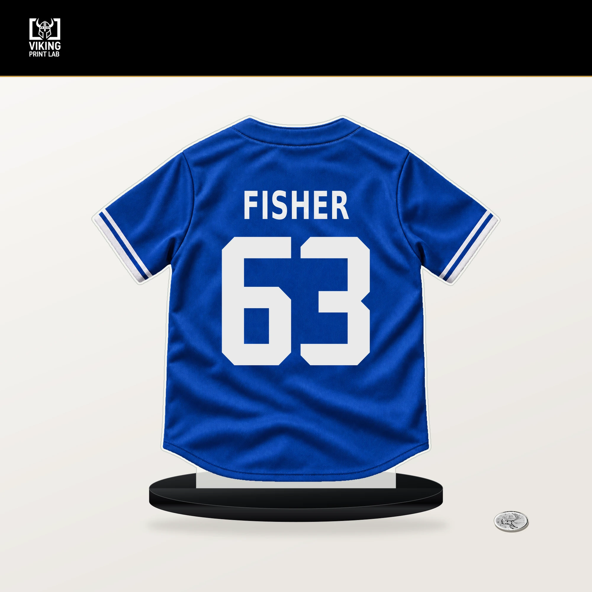 Braydon Fisher number 63 Toronto Blue Jays jersey stand with included black base.