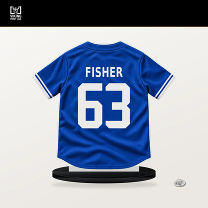Braydon Fisher number 63 Toronto Blue Jays jersey stand with included black base.