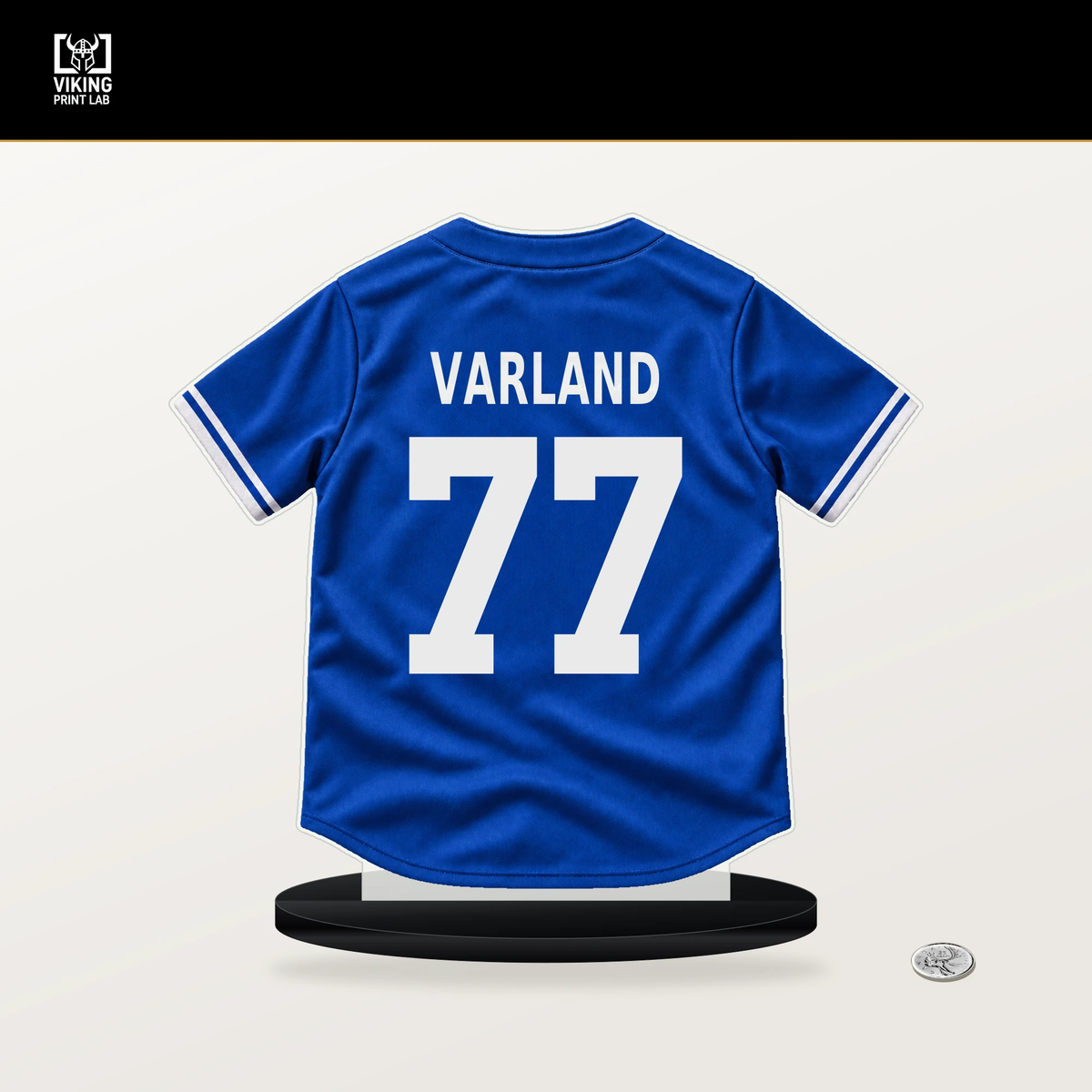 Louis Varland number 77 Toronto Blue Jays jersey stand with included black base.