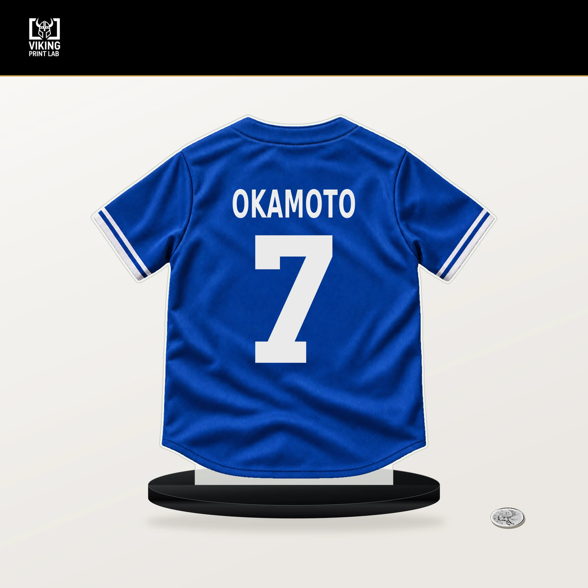Kazuma Okamoto number 7 Toronto Blue Jays jersey stand with included black base.