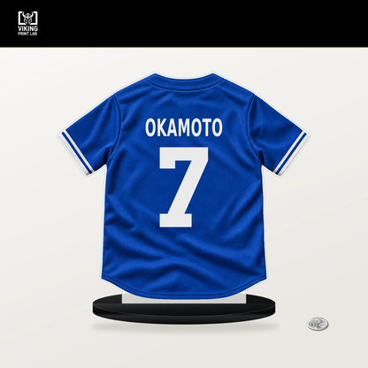 Kazuma Okamoto number 7 Toronto Blue Jays jersey stand with included black base.