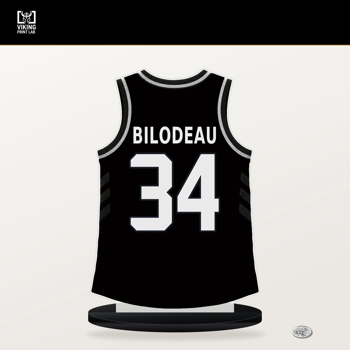 Tyler Bilodeau number 34 Brooklyn Nets jersey stand with included black base.