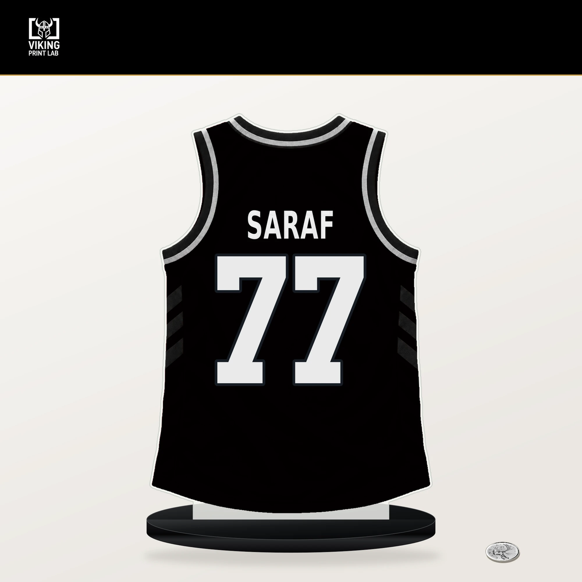 Ben Saraf number 77 Brooklyn Nets jersey stand with included black base.