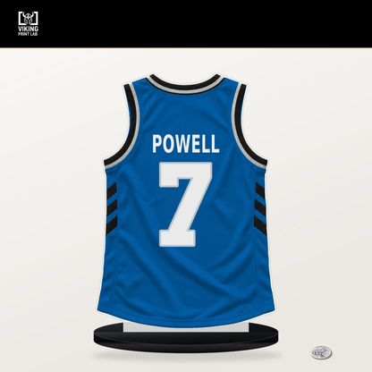 Dwight Powell number 7 Dallas Mavericks jersey stand with included black base.
