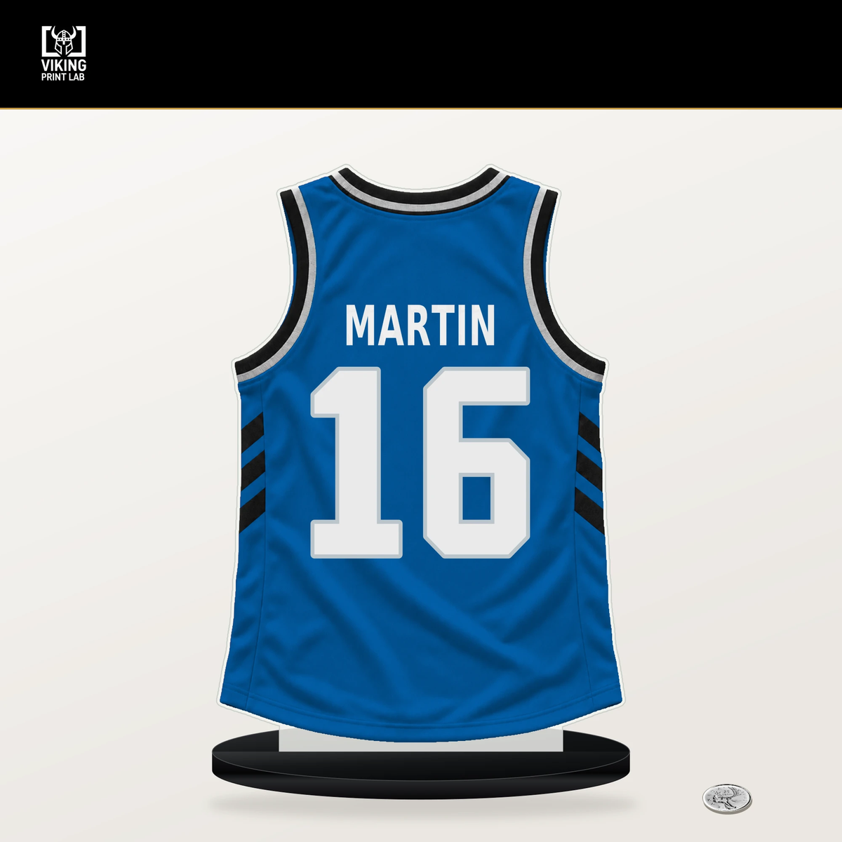 Caleb Martin number 16 Dallas Mavericks jersey stand with included black base.