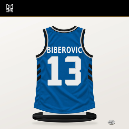Tarik Biberovic number 13 Dallas Mavericks jersey stand with included black base.