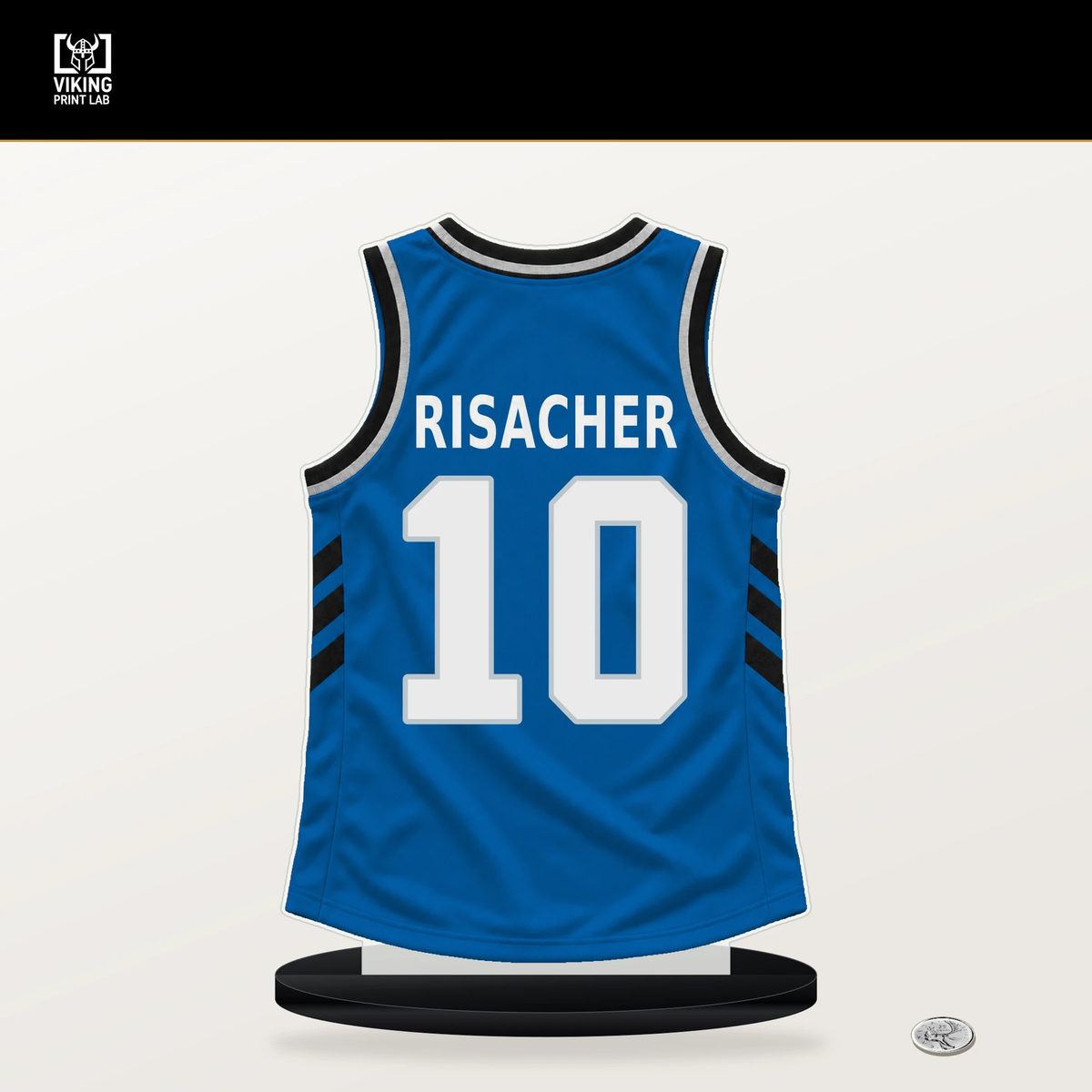 Zaccharie Risacher number 10 Dallas Mavericks jersey stand with included black base.