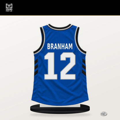 Malaki Branham number 12 Orlando Magic jersey stand with included black base.
