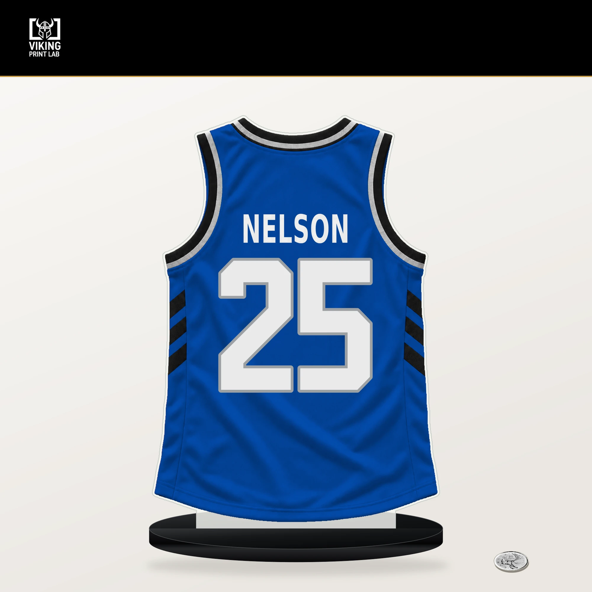 Izaiyah Nelson number 25 Orlando Magic jersey stand with included black base.