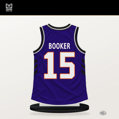Devin Booker number 15 Phoenix Suns jersey stand with included black base.