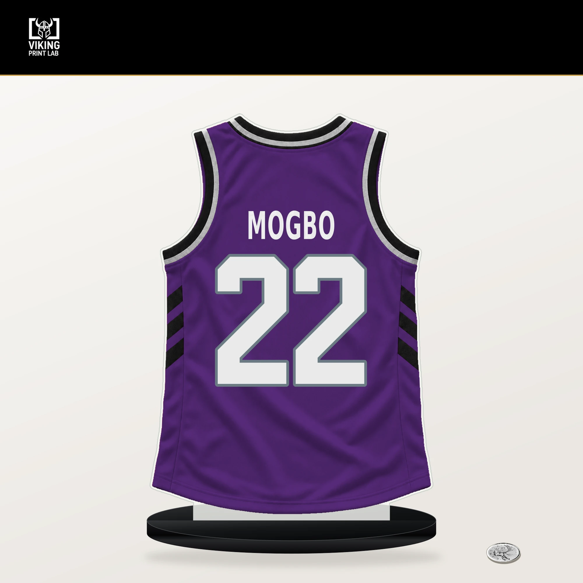 Jonathan Mogbo number 22 Sacramento Kings jersey stand with included black base.