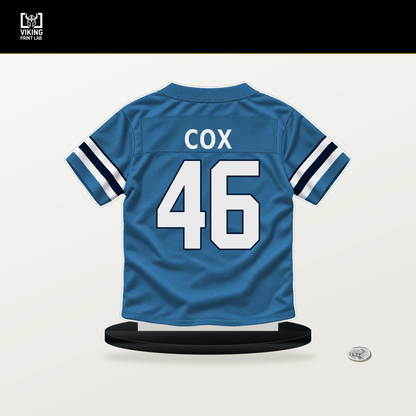 Morgan Cox number 46 Tennessee Titans jersey stand with included black base.