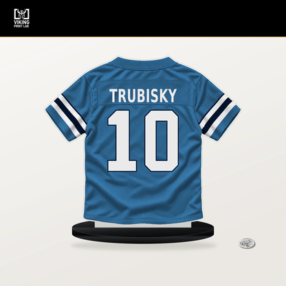 Mitchell Trubisky number 10 Tennessee Titans jersey stand with included black base.