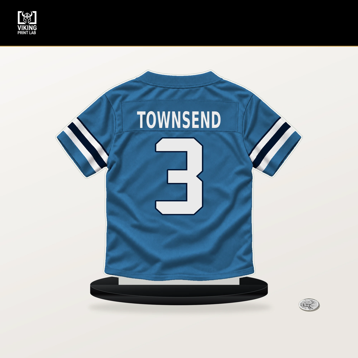 Tommy Townsend number 3 Tennessee Titans jersey stand with included black base.