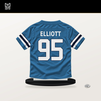 Jordan Elliott number 95 Tennessee Titans jersey stand with included black base.