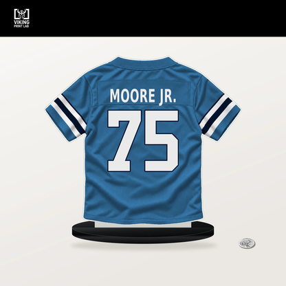 Dan Moore Jr. number 75 Tennessee Titans jersey stand with included black base.
