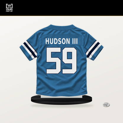 James Hudson III number 59 Tennessee Titans jersey stand with included black base.