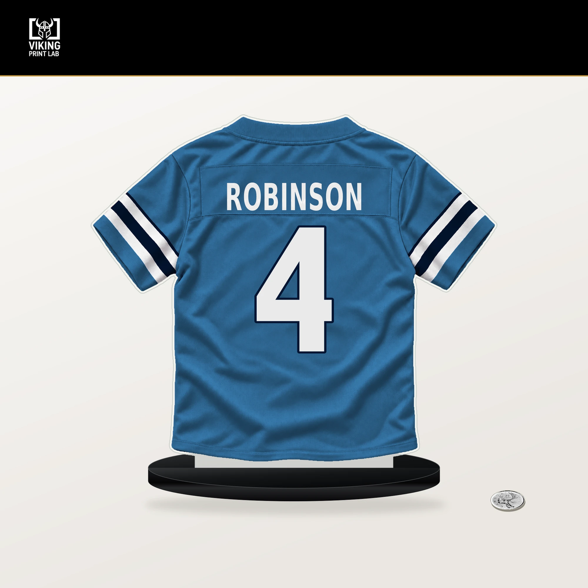 Wan'Dale Robinson number 4 Tennessee Titans jersey stand with included black base.