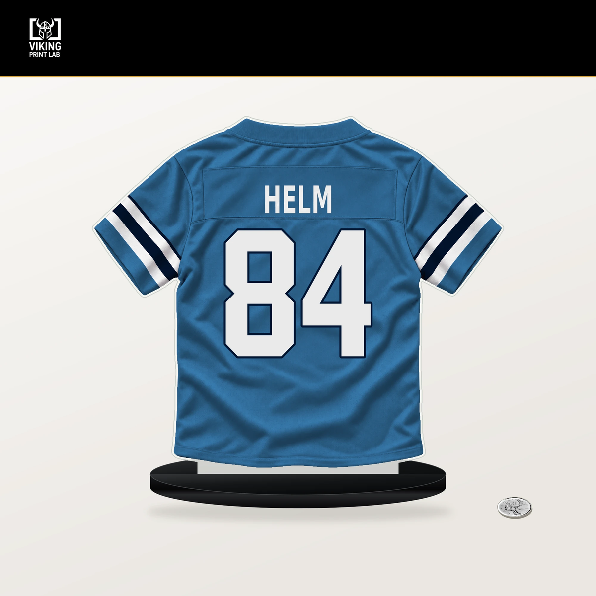 Gunnar Helm number 84 Tennessee Titans jersey stand with included black base.