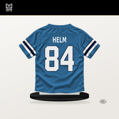 Gunnar Helm number 84 Tennessee Titans jersey stand with included black base.