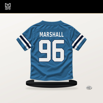 Jackie Marshall number 96 Tennessee Titans jersey stand with included black base.