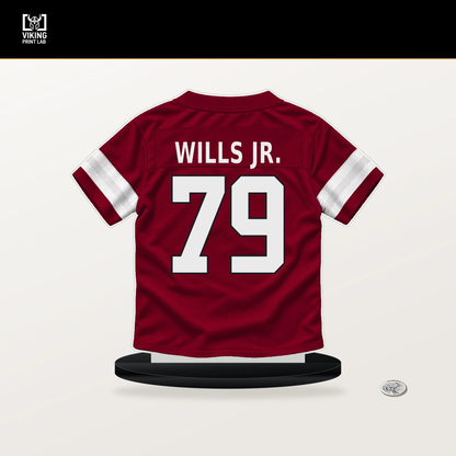 Jedrick Wills Jr. number 79 Arizona Cardinals jersey stand with included black base.