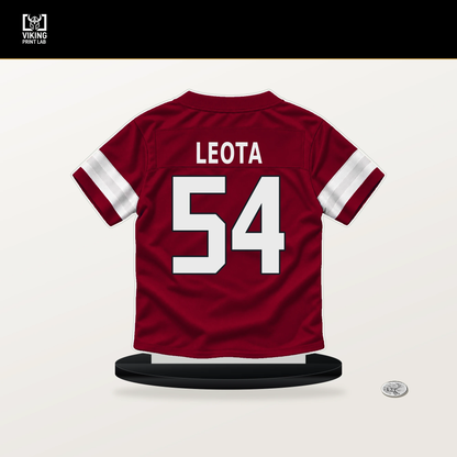 Eku Leota number 54 Arizona Cardinals jersey stand with included black base.