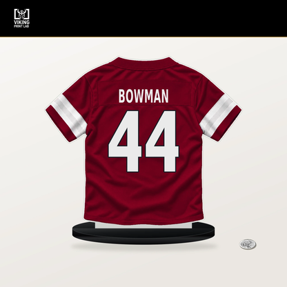 Shawn Bowman number 44 Arizona Cardinals jersey stand with included black base.