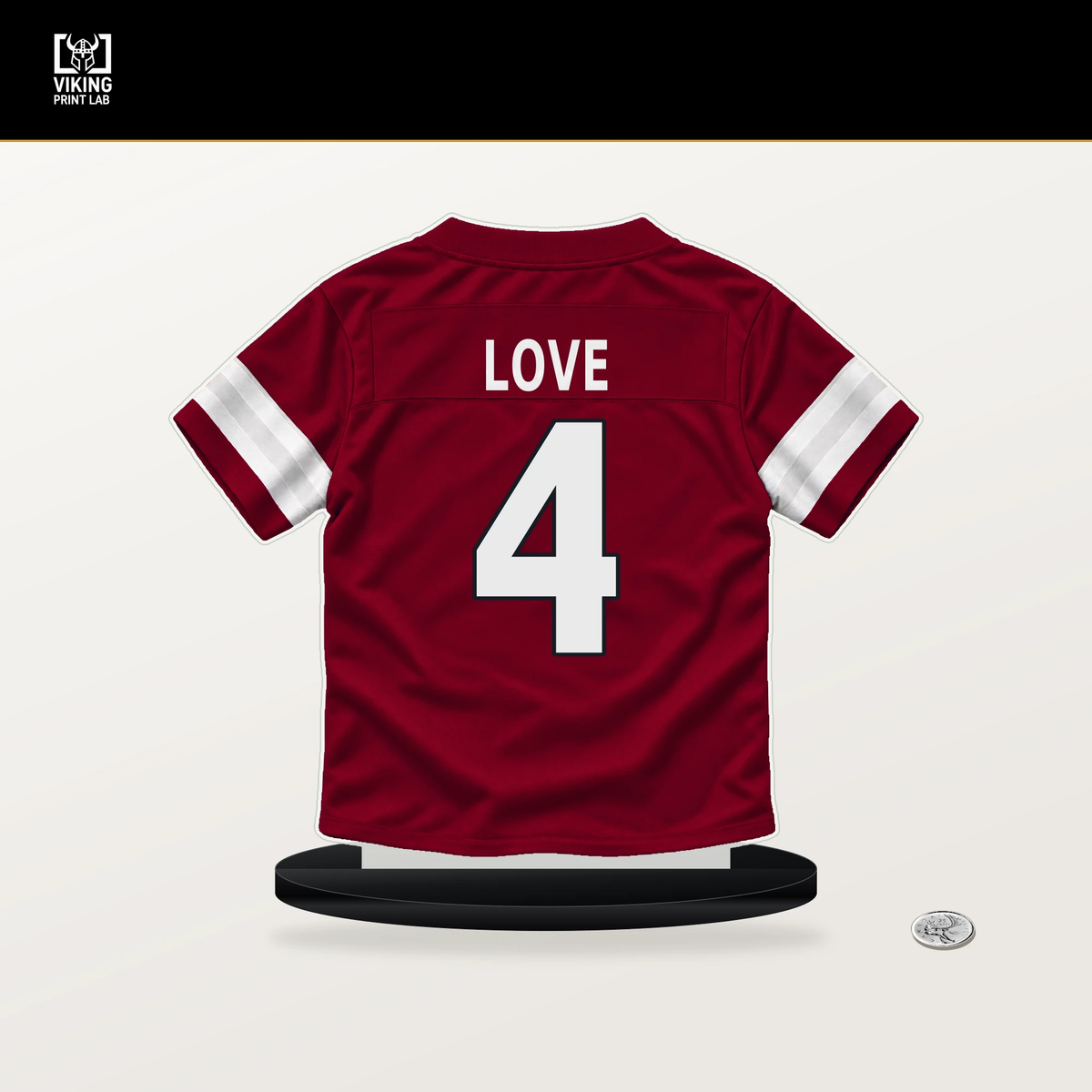 Jeremiyah Love number 4 Arizona Cardinals jersey stand with included black base.