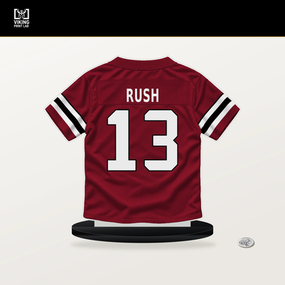 Cooper Rush number 13 Atlanta Falcons jersey stand with included black base.