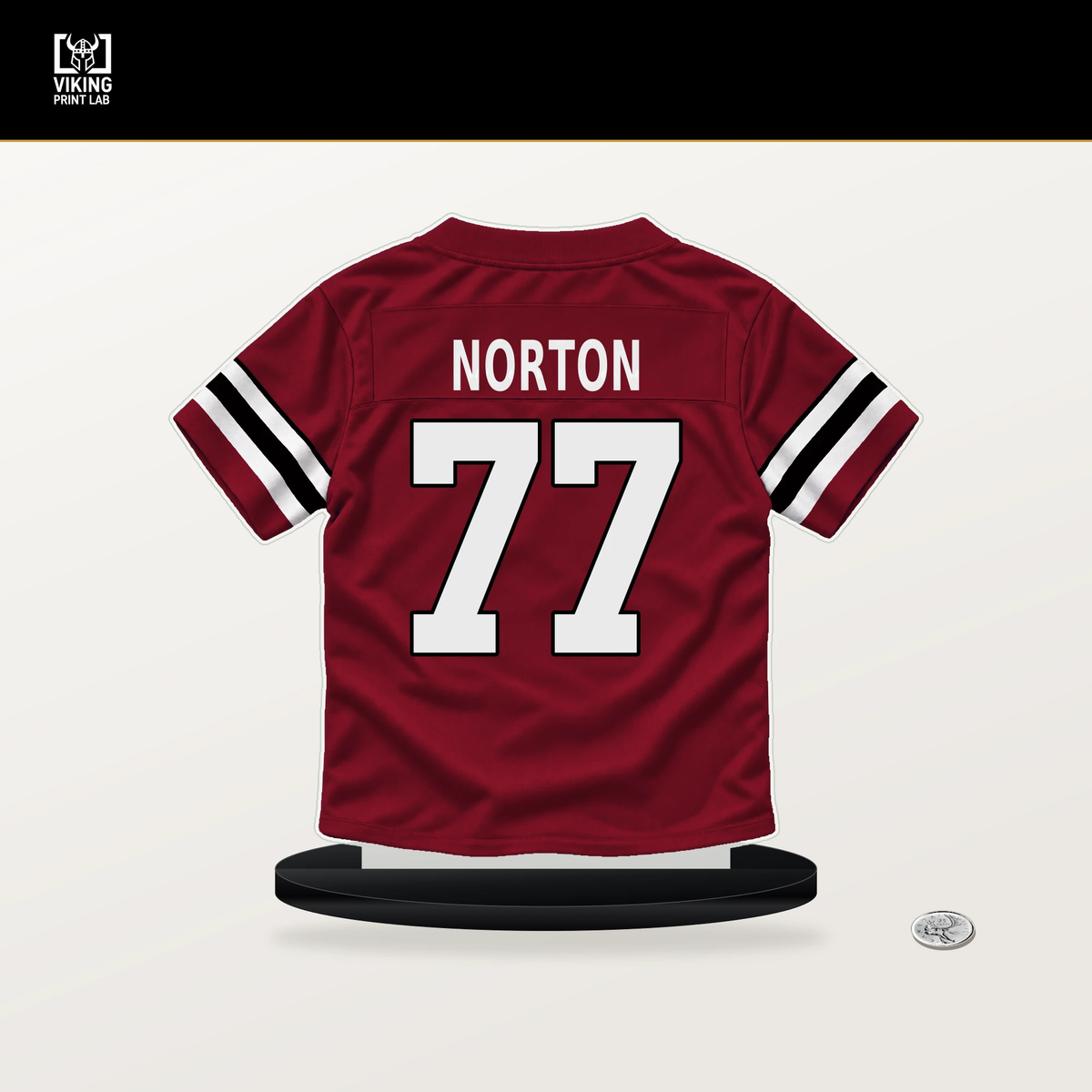 Storm Norton number 77 Atlanta Falcons jersey stand with included black base.