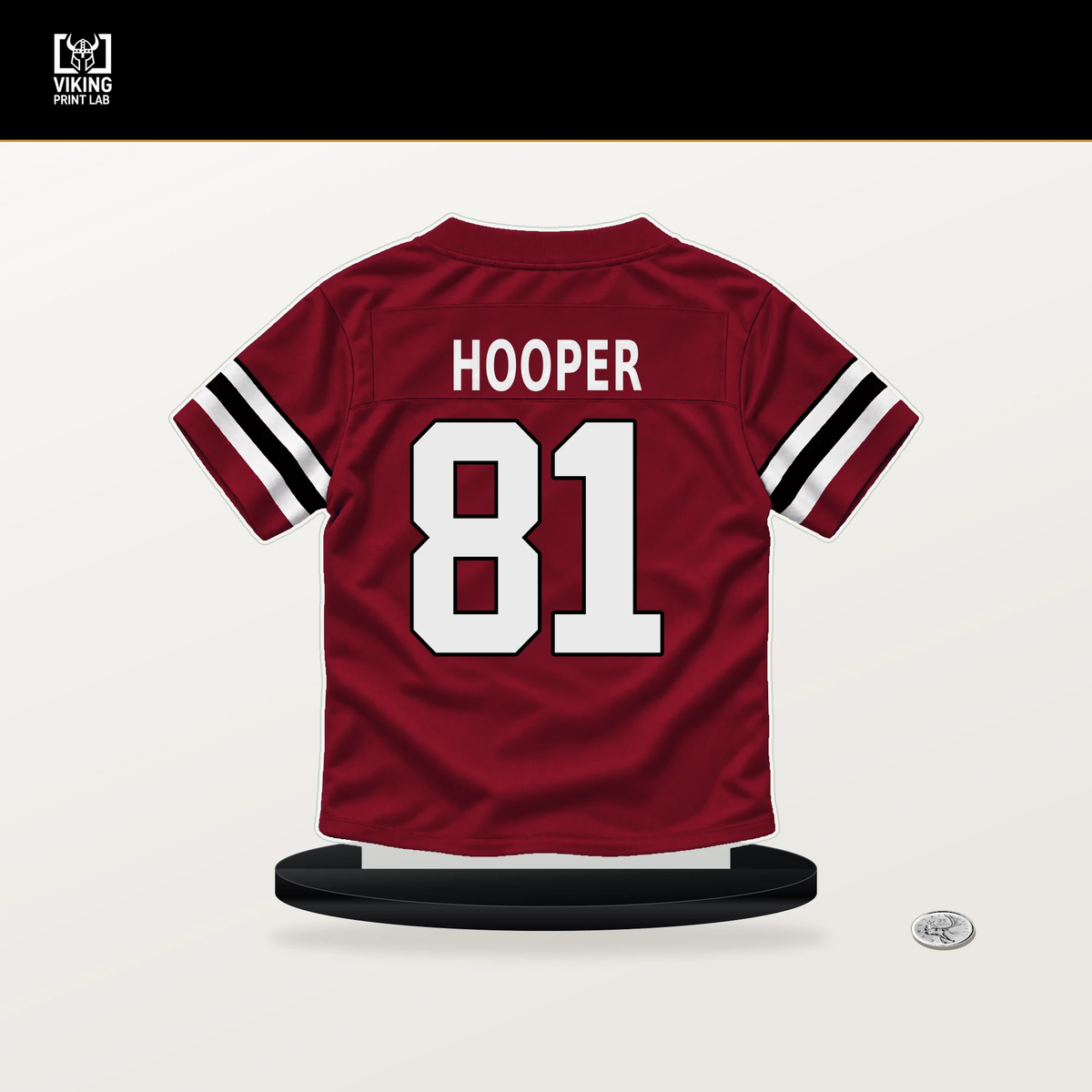 Austin Hooper number 81 Atlanta Falcons jersey stand with included black base.