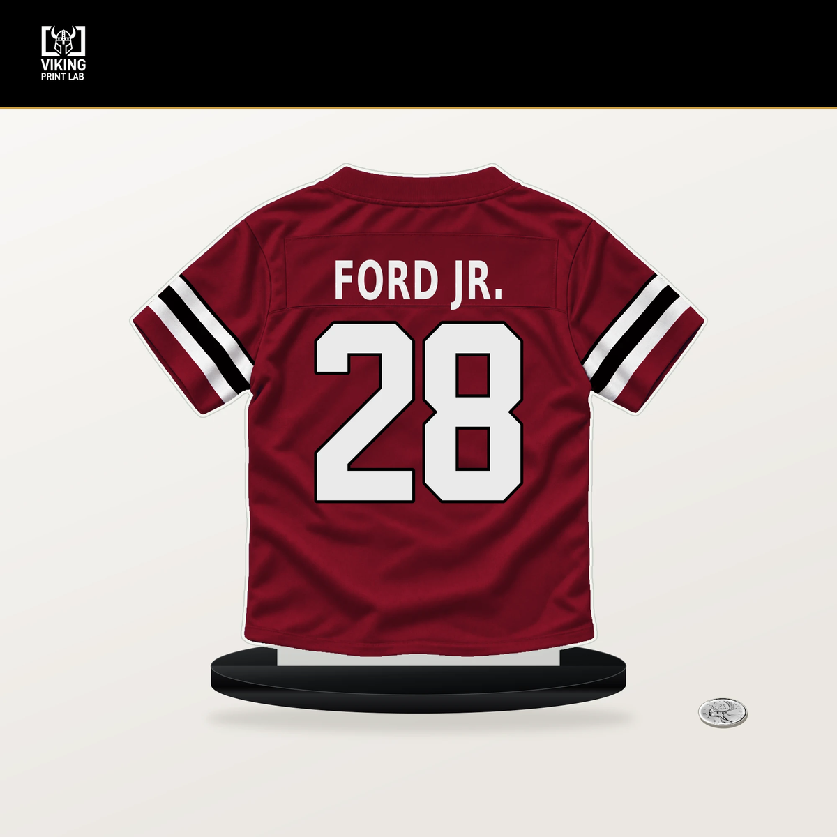 Mike Ford Jr. number 28 Atlanta Falcons jersey stand with included black base.