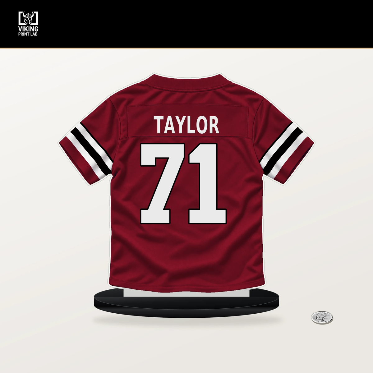 Jawaan Taylor number 71 Atlanta Falcons jersey stand with included black base.