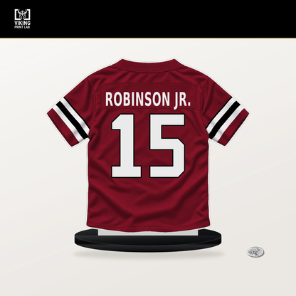 Brian Robinson Jr. number 15 Atlanta Falcons jersey stand with included black base.