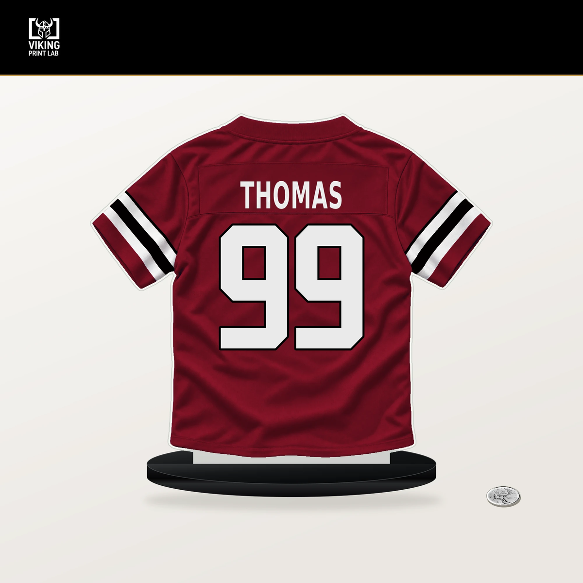 Cameron Thomas number 99 Atlanta Falcons jersey stand with included black base.