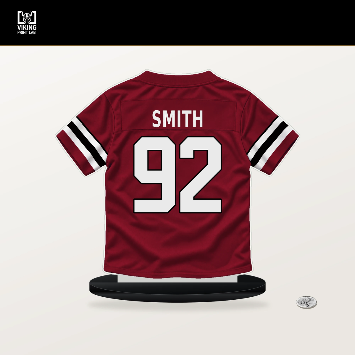 Maason Smith number 92 Atlanta Falcons jersey stand with included black base.