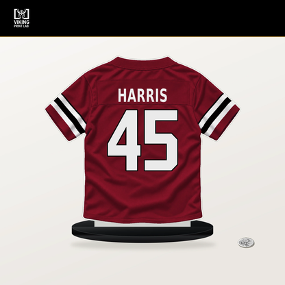 Christian Harris number 45 Atlanta Falcons jersey stand with included black base.