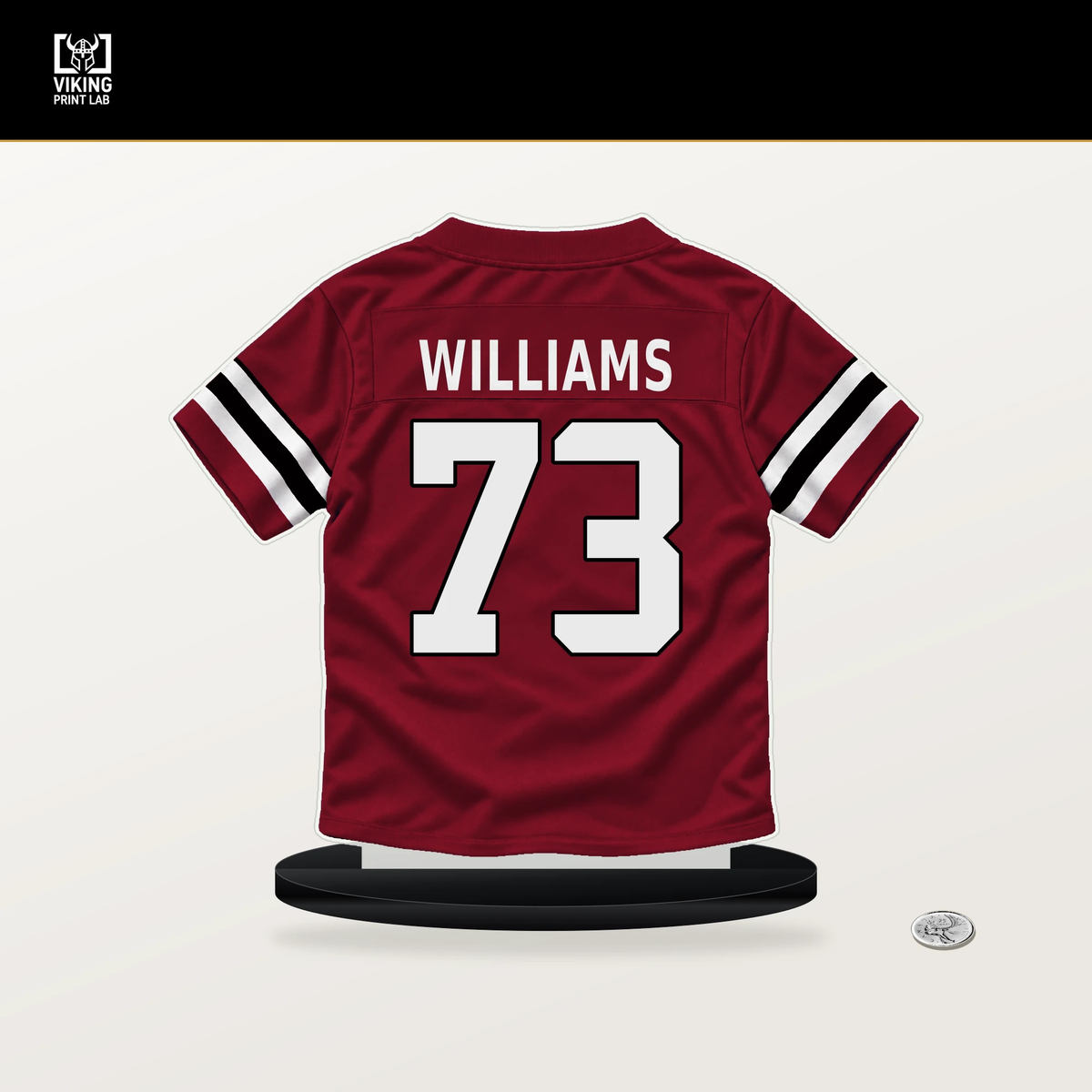 Cameron Williams number 73 Atlanta Falcons jersey stand with included black base.