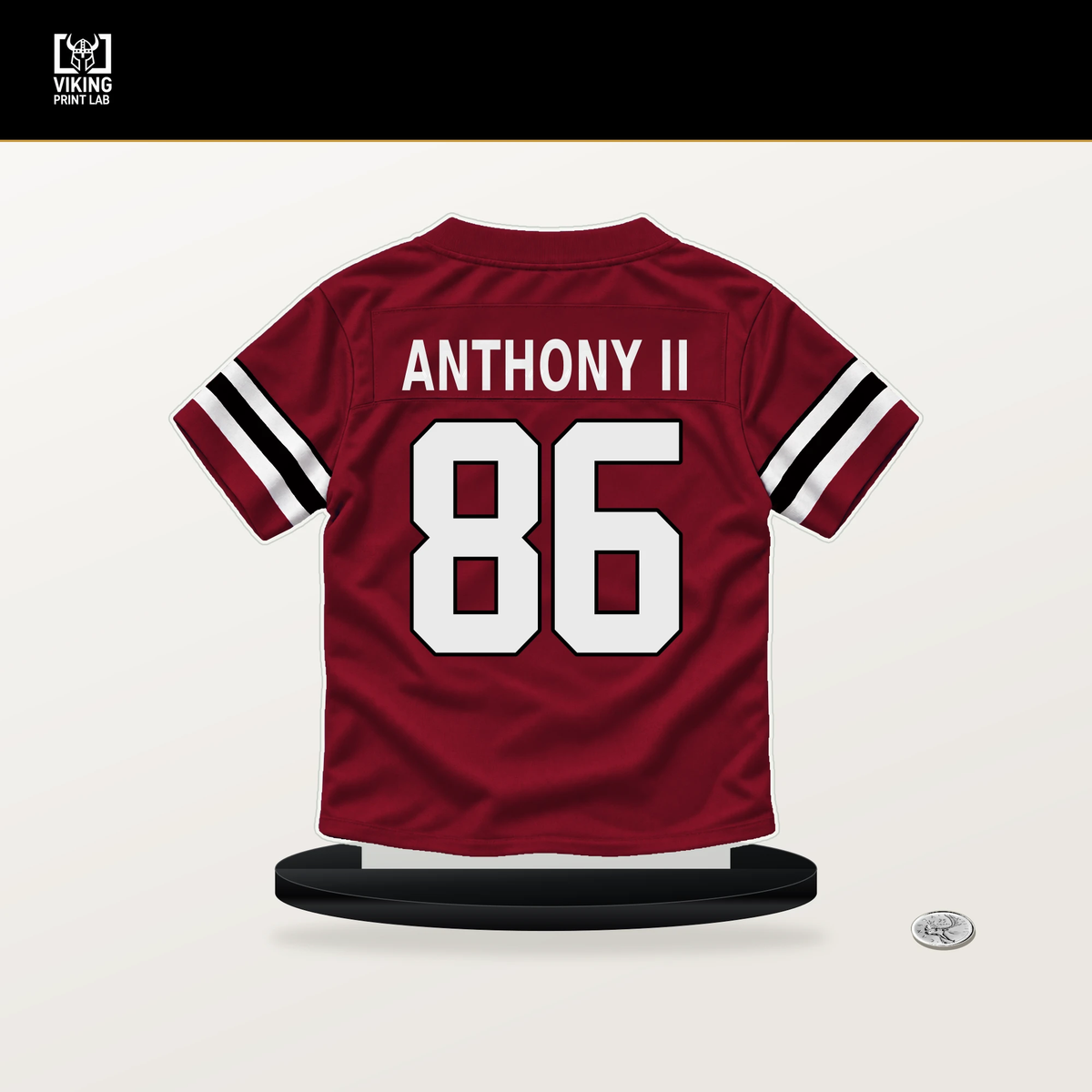 Vinny Anthony II number 86 Atlanta Falcons jersey stand with included black base.