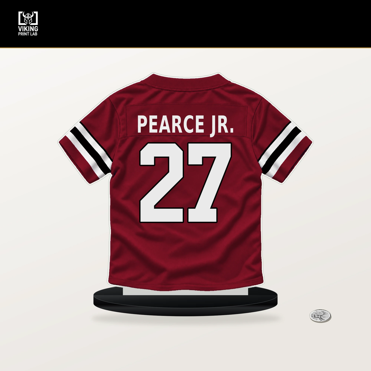James Pearce Jr. number 27 Atlanta Falcons jersey stand with included black base.