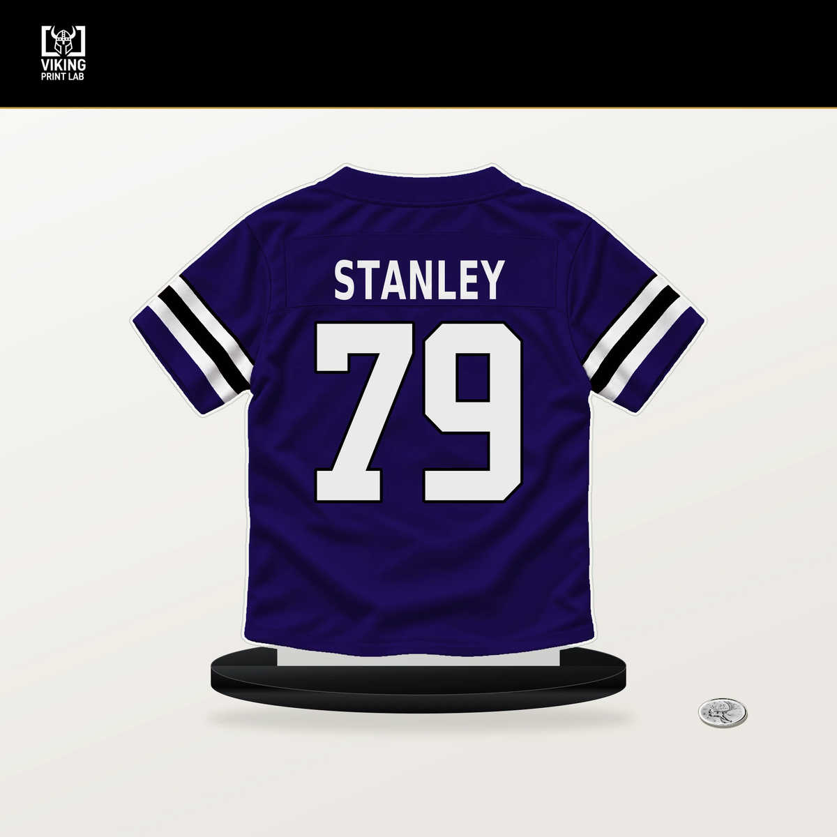 Ronnie Stanley number 79 Baltimore Ravens jersey stand with included black base.