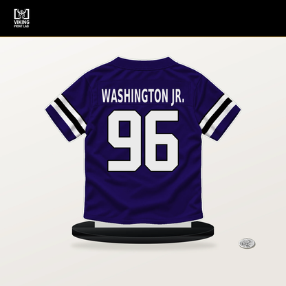 Broderick Washington Jr. number 96 Baltimore Ravens jersey stand with included black base.