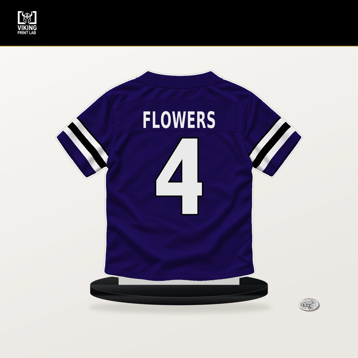 Zay Flowers number 4 Baltimore Ravens jersey stand with included black base.