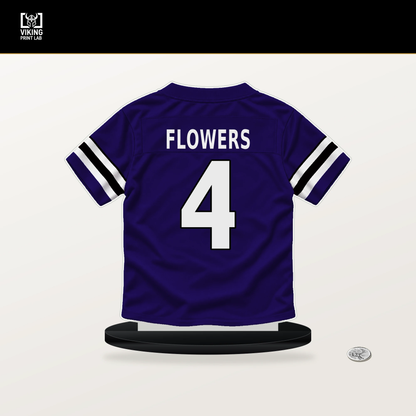 Zay Flowers number 4 Baltimore Ravens jersey stand with included black base.