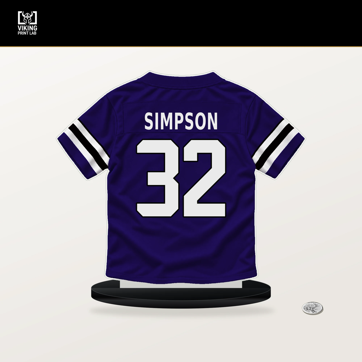 Trenton Simpson number 32 Baltimore Ravens jersey stand with included black base.