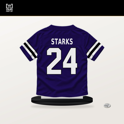 Malaki Starks number 24 Baltimore Ravens jersey stand with included black base.