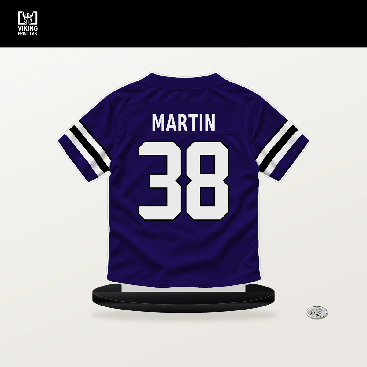 Keyon Martin number 38 Baltimore Ravens jersey stand with included black base.